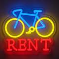 Bicycle with "RENT" Text Below Bike Rental Neon Sign